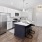 Modern apartment kitchen with pendant lighting and stainless steel appliances in homes at The Beckett