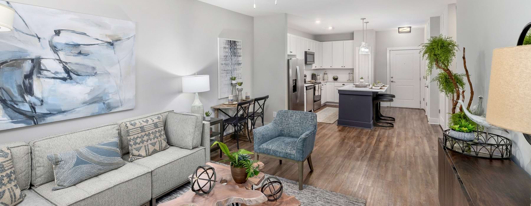 Furnished apartment living room inside a home at The Beckett