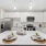 Stainless steel appliances and modern finishes inside apartment homes at The Beckett